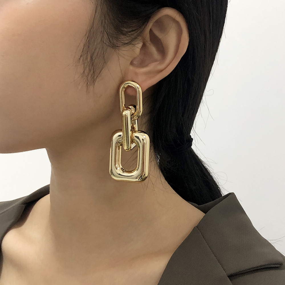 Modely Aretes exagerados dorados
